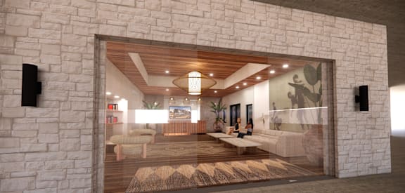 A modern interior with a stone wall and a glass door.