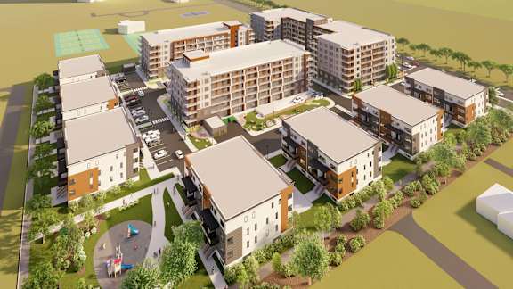 A rendering of a proposed apartment complex with a playground.