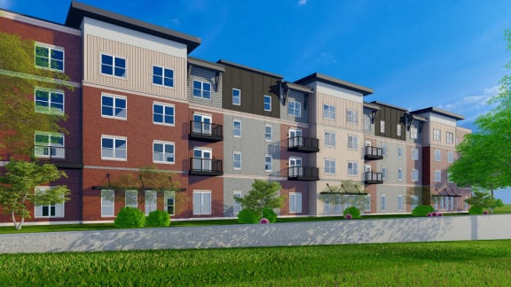 a rendering of an apartment building with a green lawn