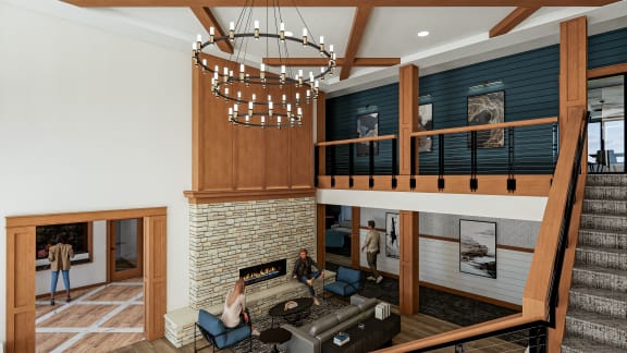 a living room with a fireplace and a loft