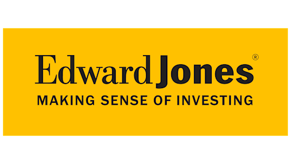 A yellow sign with the words Edward Jones and Making Sense of Investing.