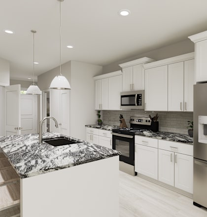 A modern kitchen with a marble countertop and stainless steel appliances.