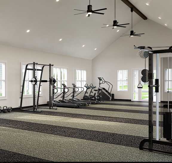 two people working out on weights in a gym at The Junction at Rockledge Apartments, Florida, 32955