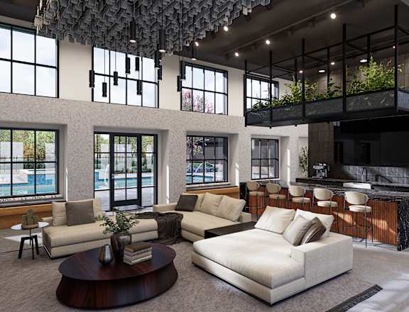 A modern living room with a large white sofa and a coffee table. at The Logan Luxury Apartments, Idaho, 83651