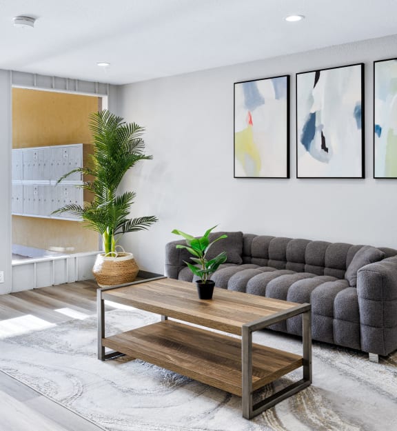 a living room with a couch and a coffee table
