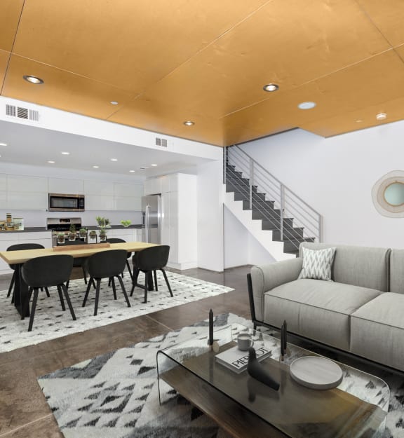 a living room with a couch and a table
