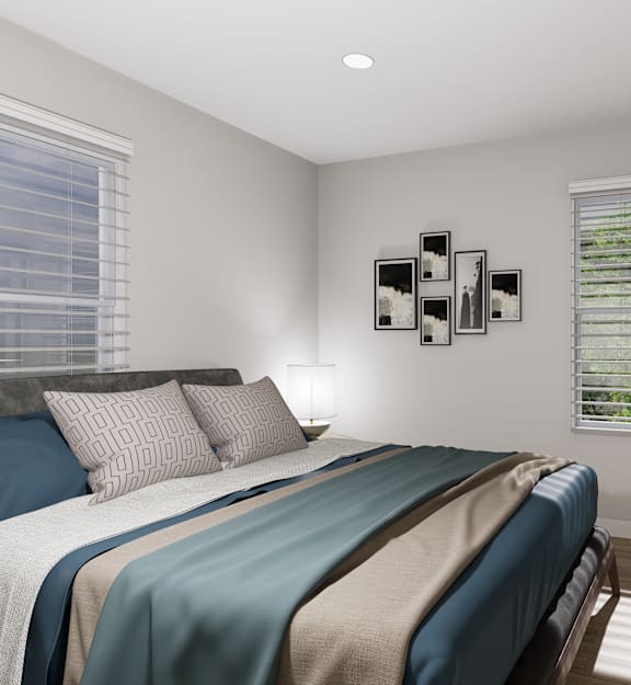 a bedroom with a bed and two windows