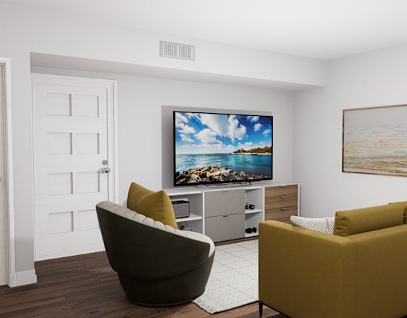 a living room with a couch and a television on the wall