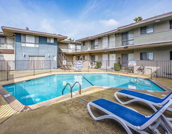 our apartments have a resort style pool with chairs