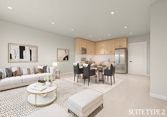 A modern living room with a dining area and kitchen in the background.
