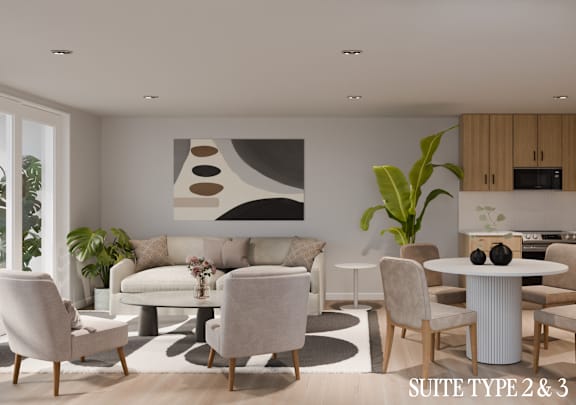 A modern living room with a grey couch, a white coffee table, and a large abstract painting on the wall.