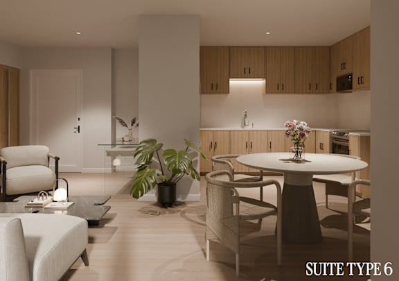 A modern living room with a dining table and chairs.