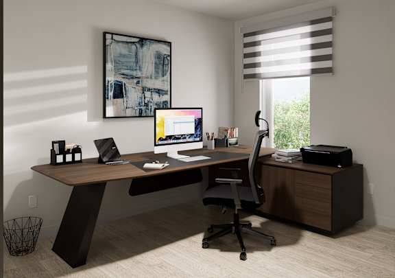 a home office with a desk and a computer