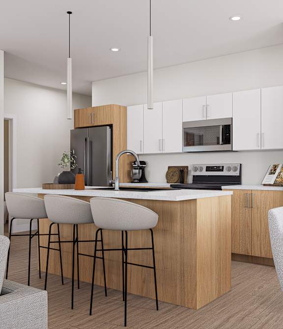 A modern kitchen with wooden cabinets and a bar area.