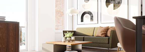 a living room with a couch and a chair and a sliding glass door