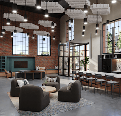 A modern living room with a fireplace and a kitchen area in the background.