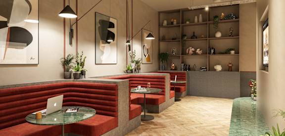 a rendering of a lounge area with red couches and tables