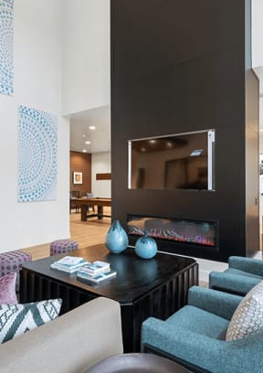 Community lounge space at Vernola Marketplace Apartments in Jurupa Valley, CA  
