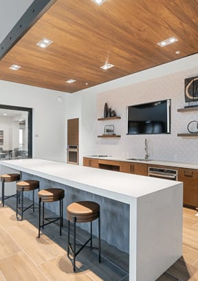 Community kitchen space at Vernola Marketplace Apartments in Jurupa Valley, CA 