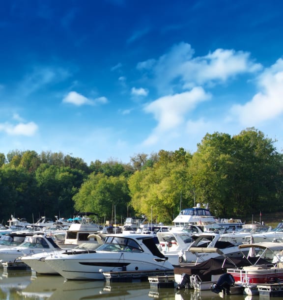 a marina filled with boats on the water