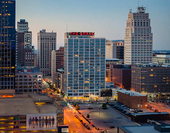 a view of the city at dusk  at The Grand, Kansas City, MO, 64106