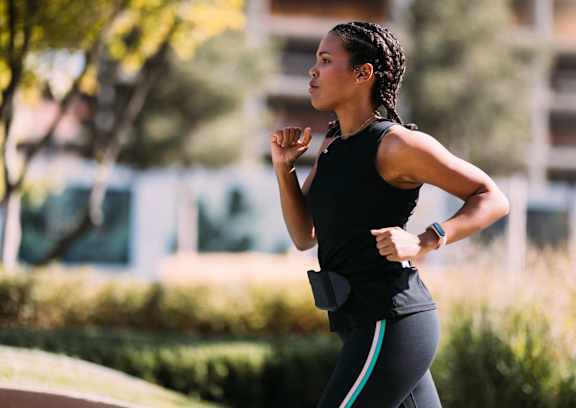 a woman running on a track in a park at Hamilton Manor Apartments, Hyattsville, Maryland