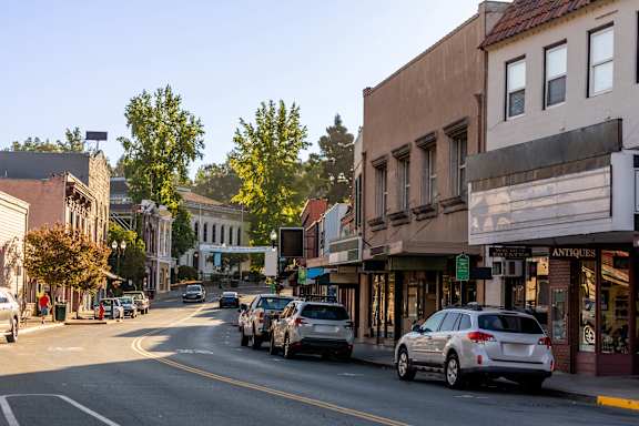 Cars are parked on the side of the street.