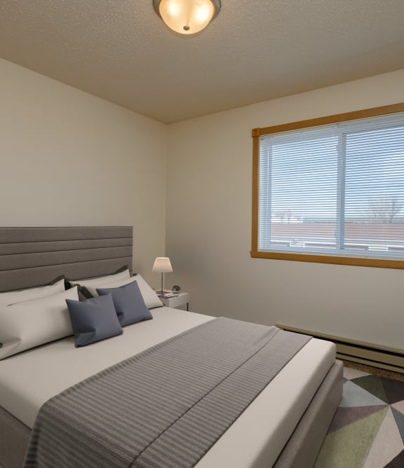 a bedroom with a window