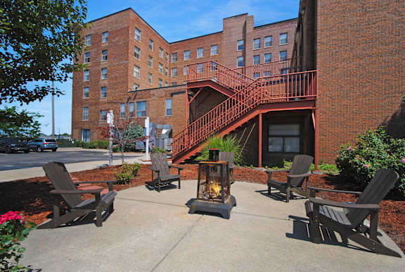 Outdoor fire pit and lounge area at Bancroft Luxury Apartments in Saginaw, MI