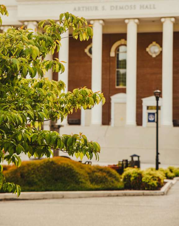 A building with the name Arthur K. Demoss Hall on it.