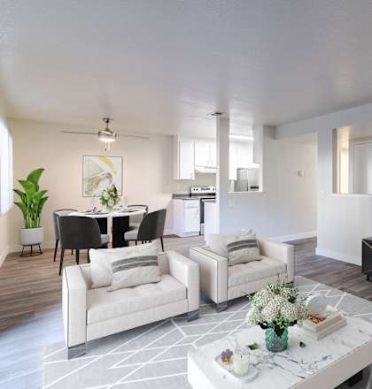 A modern living room with a black and white color scheme.