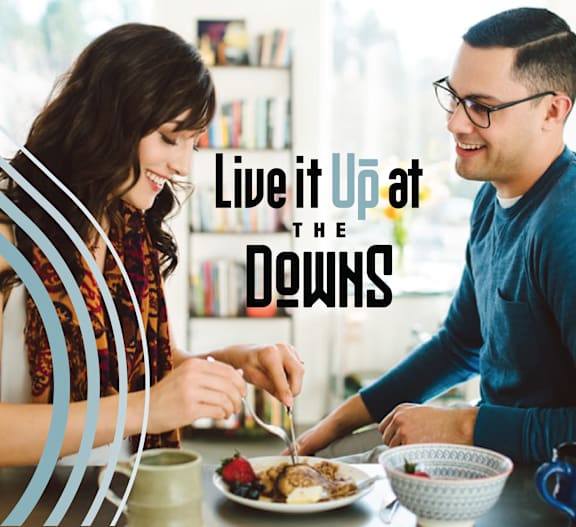 A man and a woman are having a meal together.