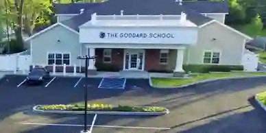 a screenshot of the school building in a parking lot