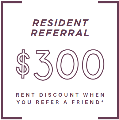 A sign advertising a $300 discount for referring a friend.