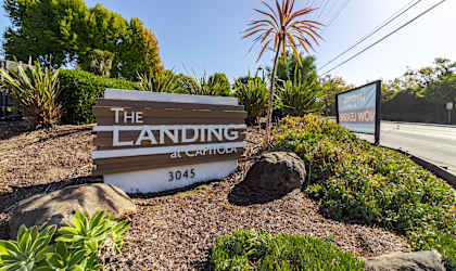 the landing at catalina sign at the entrance of the building