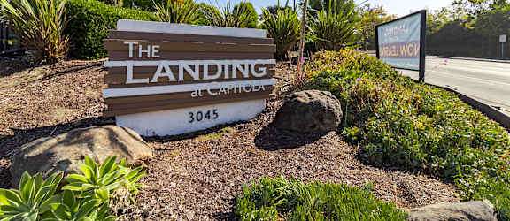 the landing at catalina sign at the entrance of the building