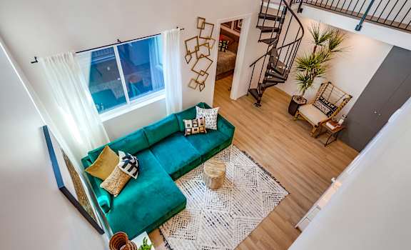 a view of the living room from the loft