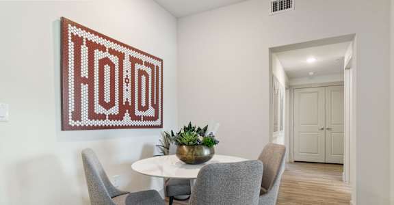 Dining Room with round table at McCarty Commons, San Marcos, Texas