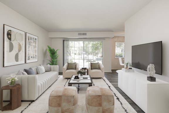 a living room with a white couch and a white coffee table at Fairfax Square, Fairfax, VA