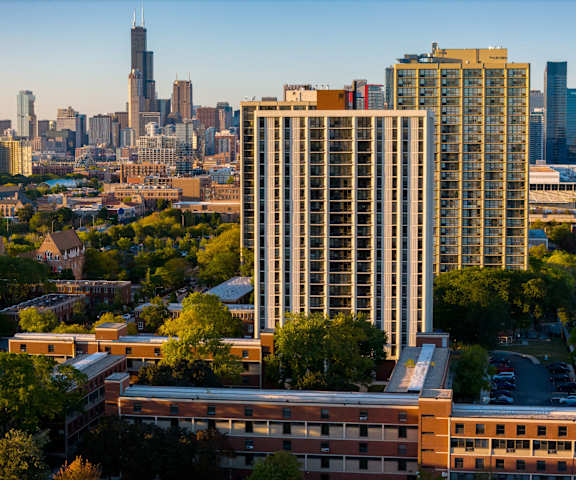 A cityscape with a mix of modern and older buildings.