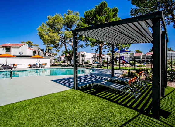 the swimming pool at the preserve at polo terrace apartments