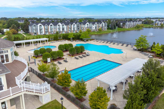 an aerial view of the resort style pool and hot tub