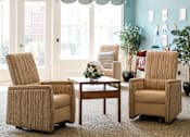 Thumbnail 15 of 17 - Two chairs and a table are in a room with a window.