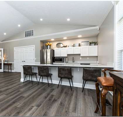 a kitchen and dining area in a 555 waverly unit