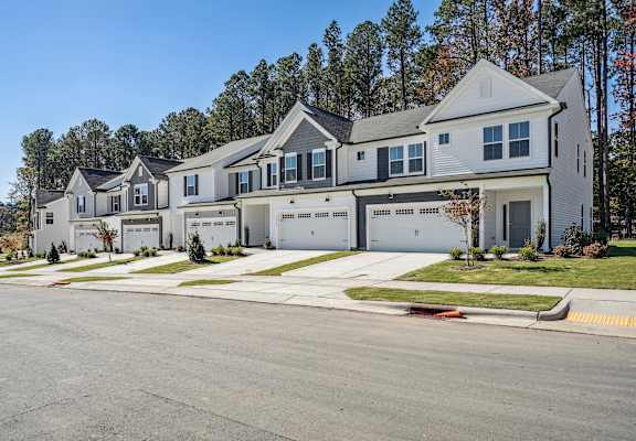 a large house with a street in front of it
