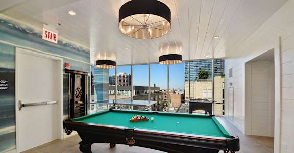 the pool room has a view of the city