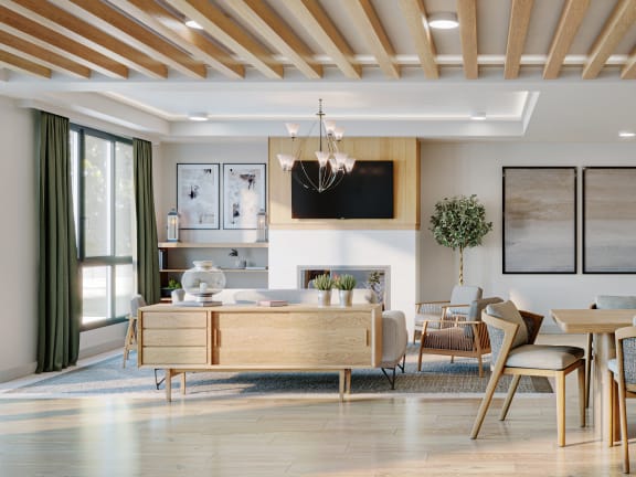 a living room and dining room with a table and chairs