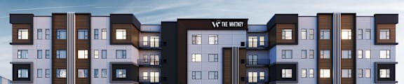 The image shows a modern multi-story residential building with a central entrance and a row of trees in front.