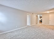 Thumbnail 15 of 28 - A spacious room with carpeted floor and white walls at Landmark at Lyncrest Reserve Apartments, Nashville, TN, 37209