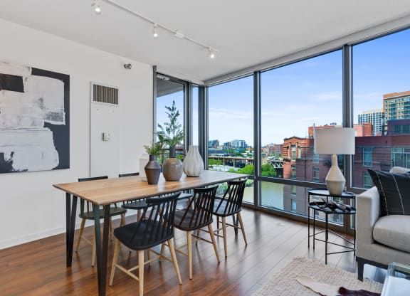 Dining table focused living room shot at Kingsbury Plaza, Chicago